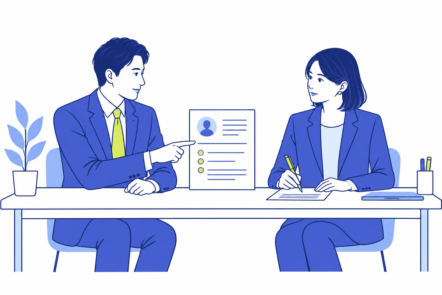 求人情報を見ながら対話し、企業への理解を深める二人の担当者